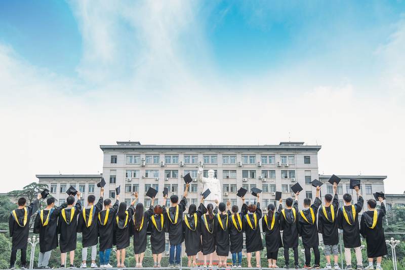 University graduates celebrating at commencement